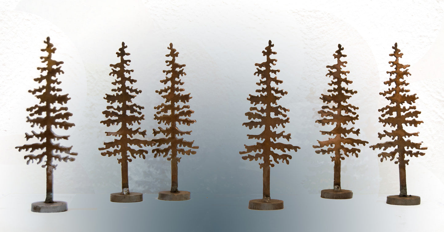 Metal pine tree sculpture by Dave Larson